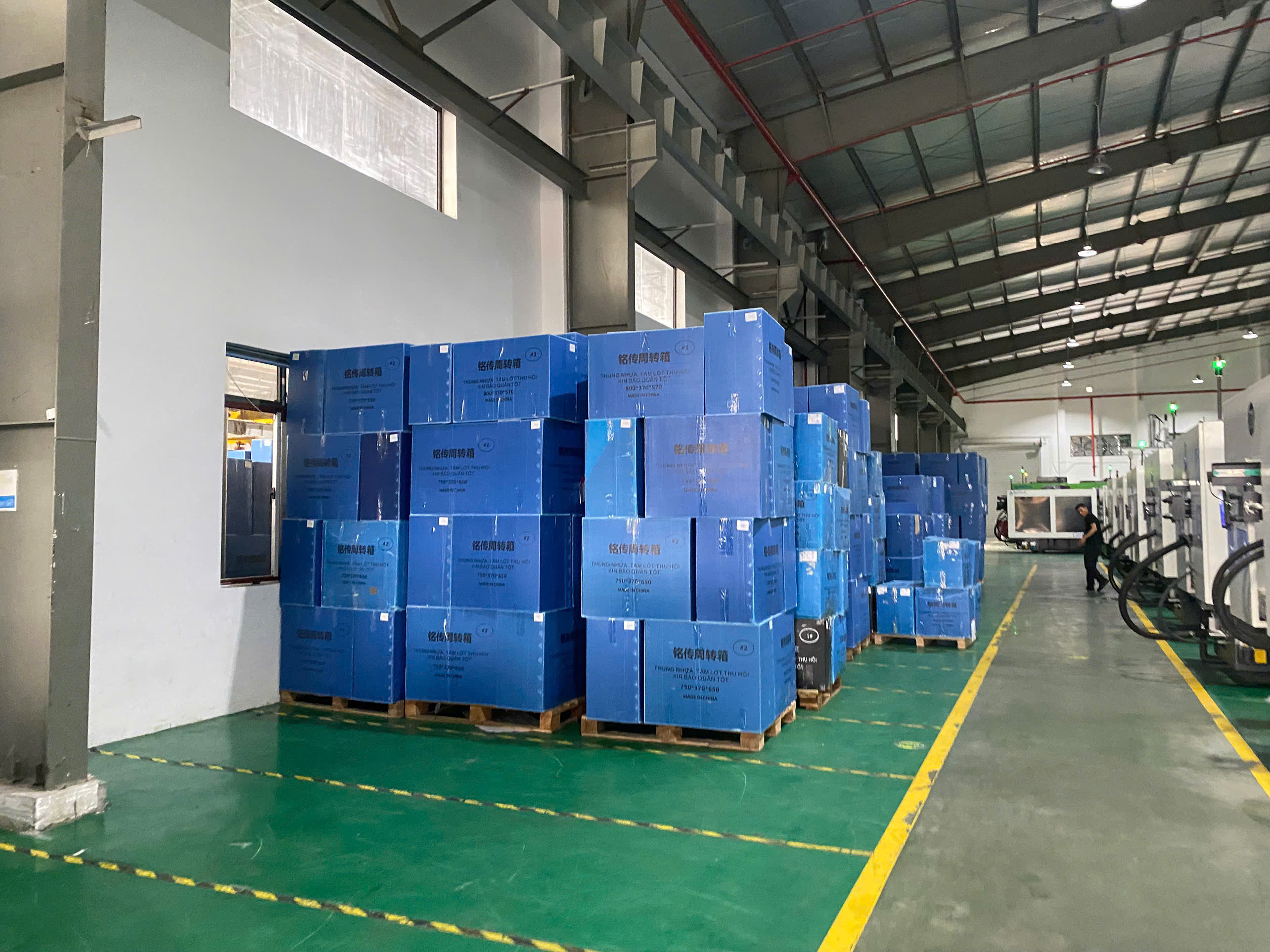 Organized layout of approved goods near molding machine.jpg